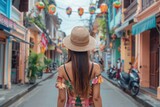 Fototapeta Uliczki - Young Woman Summer. Boho girl exploring the old town streets of Phuket, Siam