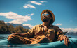 © Coco.Ratta - African American man with afro hair is lying and relaxing on rubber boat with sunshine in the blue sea