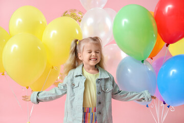 Poster - Happy little girl with colorful balloons on pink background