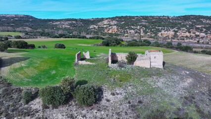 Wall Mural - Aerial view from a drone of the ruins of the Virgen del Val hermitage in Piquera de San Esteban in the Tierras del Burgo region. Province of Soria. Castile and Leon. Spain. Europe