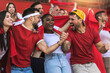 © Mediteraneo - Football / soccer fans are cheering for their team at the stadium on the match