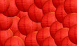 a background of red lanterns flying high in the sky
