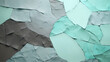 Closeup of colored mosaic stone wall in grey and turquoise, modern abstract background textured design with crumpled, rough surface