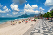 Ipanema beach with mosaic of sidewalk and mountain Dois Irmao (Two Brother)  in Rio de Janeiro, Brazil. Ipanema beach is the most famous beach of Rio de Janeiro, Brazil. Cityscape of Rio de Janeiro
