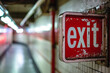 Emergency exit sign, with writing “exit”

