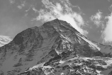 Grayscale shot of the beautiful snowy Mer de Glace in the French Alps