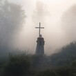  Foggy vistas reveal a Cross