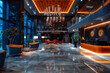 A striking hotel lobby at night featuring modern interior design, vibrant orange accents, and sophisticated marble flooring under ambient lighting..