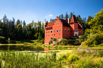 Sticker - The Cervena (Red) Lhota Chateau is a beautiful and unique example of Renaissance architecture. It is located in the South Bohemian Region of the Czech Republic, surrounded by a picturesque lake.