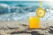 Lemonade On The Beach In The Sand Against The Background Of The Sea Or Ocean With A Place For An Inscription Or Logo