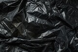 Fototapeta Przestrzenne - Black plastic bag texture. Abstract background for design with copy space
