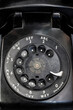 Antique phone with a rotary dial. Before cell phones, people had to dial phone numbers on a noisy rotary dial.