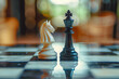 © Purple_Lamp - White king and black rook on a marble chessboard with a shallow depth of field.