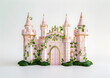 Medieval fortress with towers, pastel pink toy, wrapped in ivy and moss, motif from fairy tales about princesses