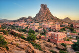 Fototapeta Miasto - Tafraout town and Napoleon's Hat rock, Atlas mountains, Morocco, in sunset light