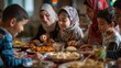 © GulArt - Family gathered around table for the iftar meal in Ramadan