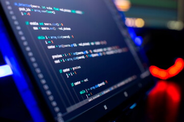 IT business.Monitor closeup of function source code. Project managers work