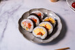 The sushi roll made with raw fish and egg for a healthy lifestyle eating. Japanese delicious cuisine and food. 