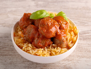 Poster - Mini beef meatballs in tomato sauce over rice