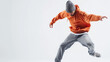 A young hip hop dancer is dancing on a white background