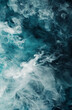 Smokey abstract background with blue, grey, white and black wisps of smoke swirling and mixing.