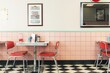 Interior design with furniture in a checkered floor diner