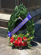 lest we forget wreath with poppy flowers at war memorial in Australia
