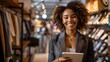 © Irina Ukrainets - Confident young businesswoman in a stylish suit working on a tablet in a modern clothing store. Casual professional setting. AI