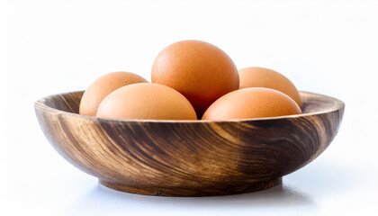 Canvas Print - Egg in wooden bowl isolated on white background, with clipping path, concept Ready to cook eggs, Fresh from farm