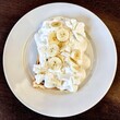 Viennese waffles with banana and whipped cream
