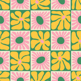 Fototapeta Panele - Colorful floral seamless pattern illustration. Vintage style hippie flower background design. Geometric checkered wallpaper print, spring season nature backdrop texture with daisy flowers.
