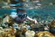 kid in goggles discovering a small chest among underwater rocks