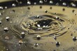 ferrofluid separating into tiny droplets around a magnetic array