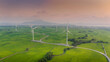© CravenA - view of turbine green energy electricity, windmill for electric power production, Wind turbines generating electricity on rice field at Phan Rang, Ninh Thuan province, Vietnam