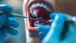 Dentistry. Young woman siting in a stomatology seat having a tooth examination by a pediatric stomatologist. Dental treatment. A close-up view of the  face, sideways in the background.
