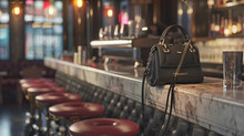 A Chic Handbag Perched On A Bar Stool In A Trendy Urban Caf?(C).
