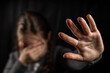 © eliosdnepr - Crying teenage girl showing a stop sign with her hand