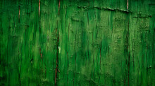Close-up Of Peeling Green Paint On A Wall