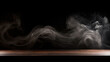Smoke rising from a wooden table in the dark