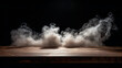 Smoke rising from wooden table in darkness