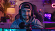 © Erzsbet - Gamer streamer youtuber or twich streamer young man teenager boy in rgb colored light