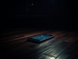 a photo of a blinking smart phone on the floor of a completely dark totally black room