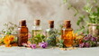 small glass bottles filled with colorful essential oils, complemented by surrounding fresh herbs and flowers