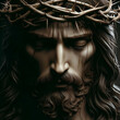 Closeup portrait of Jesus Christ sculpture with crown of thorns.
