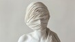 Sculpture of woman on white background