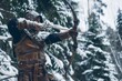 warrior in leather armor with a bow in a snowy pine forest