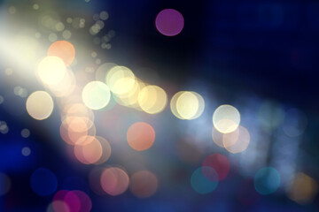 Wall Mural - blurry background image of defocused colorful abstract city street lights at night