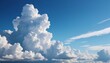 © video rost - A striking photograph of towering cumulus clouds against a deep blue sky, exuding a sense of calm and grandeur