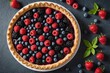 Overhead view of whole summer berry tart pie whortleberry