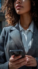 AI Generated businesswoman is using a smartphone and focus on it.